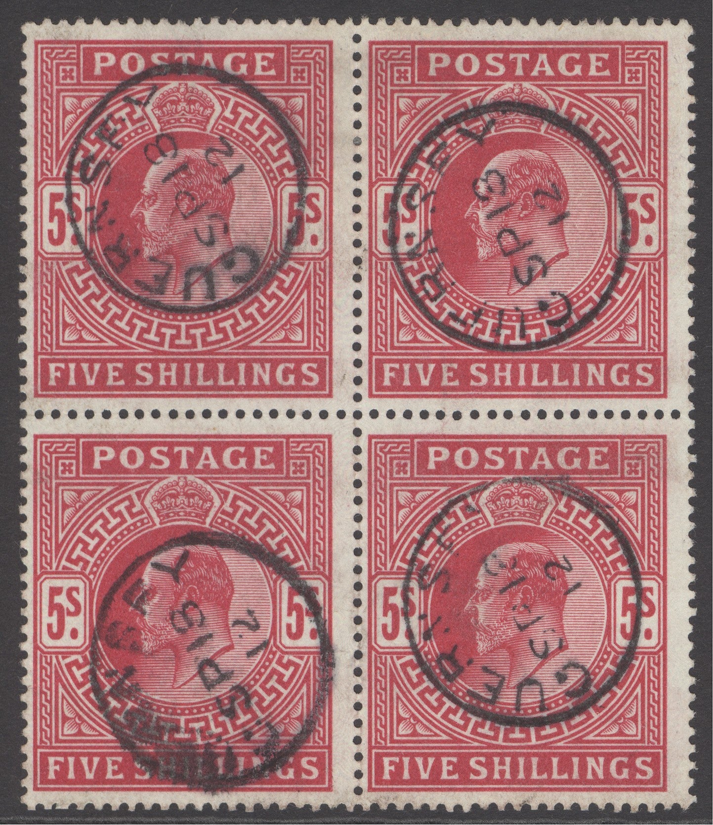 SG 318 5/- carmine block of 4. Very fine used with Guernsey CDS’s, Sept 13th 1912