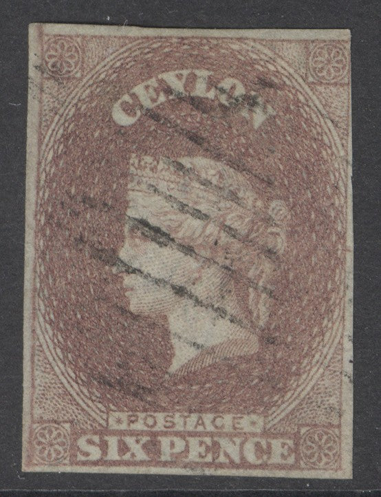 SG 1 Ceylon 1857. 6d purple-brown. Very fine used, good margins just touched at top left CAT £450