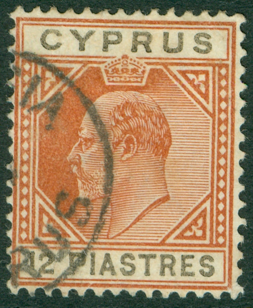 SG 57 Cyprus 1902-04. 12pi chestnut & black, watermark CA. Very fine used CAT £85