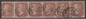 41.	SG 29 1d red-brown strip of 6 lettered GA-GF. Fine used, scarce multiple