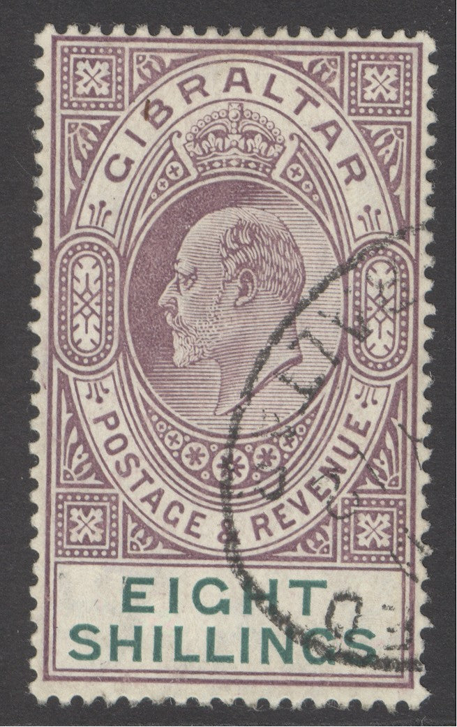 SG 74 Gibraltar 1906. 8/- purple & green. Very fine used part registered oval leaving Kings profile clear CAT £300.