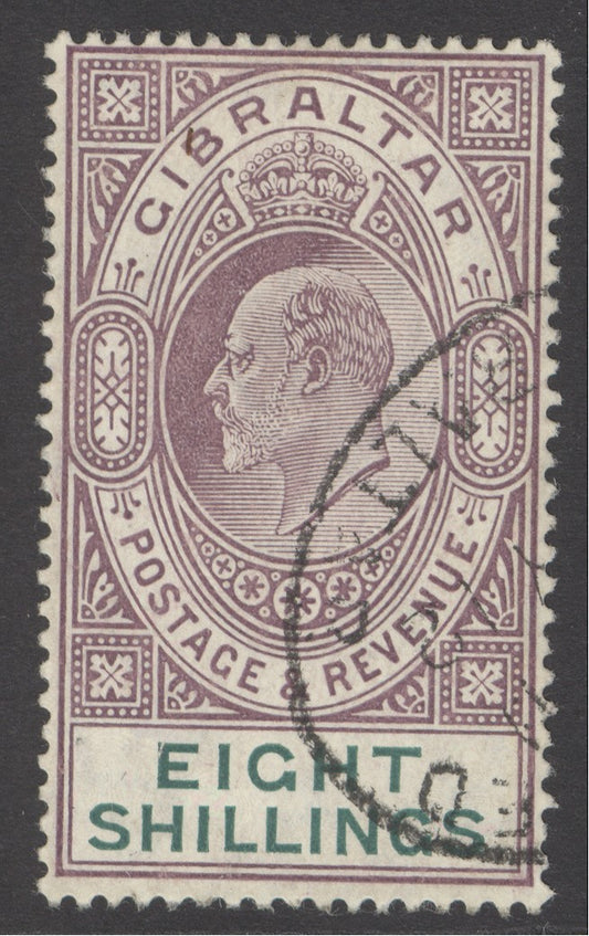 SG 74 Gibraltar 1906. 8/- purple & green. Very fine used part registered oval leaving Kings profile clear CAT £300.