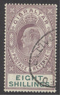 SG 74 Gibraltar 1906. 8/- purple & green. Very fine used part registered oval leaving Kings profile clear CAT £300.