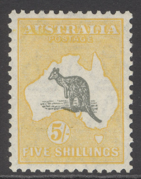 SG 111 Australia 1929-30. 5/- grey & yellow. A fine fresh very lightly mounted mint example with excellent centring CAT £275