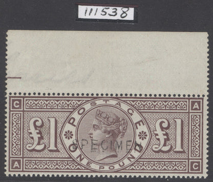 SG 186s £1 brown-lilac, watermark three orbs, overprinted specimen. A pristine unmounted mint top of sheet  marginal example. Lovely deep colour & well centred. RPS cert when in a pair CAT £6800+