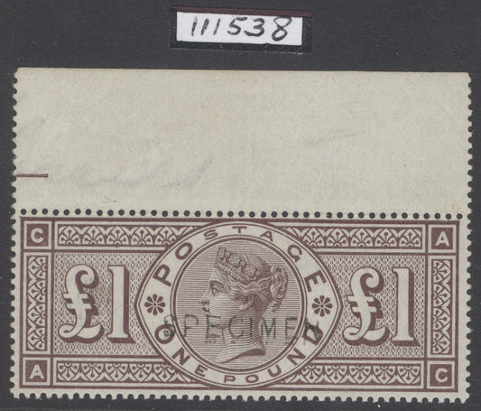SG 186s £1 brown-lilac, watermark three orbs, overprinted specimen. A pristine unmounted mint top of sheet  marginal example. Lovely deep colour & well centred. RPS cert when in a pair CAT £6800+